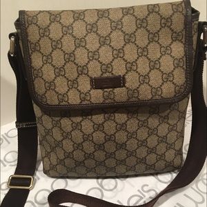 Gucci Guccissima GG leather unisex crossbody bag.
